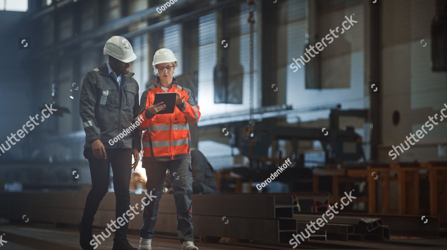 Engineers at steel factory